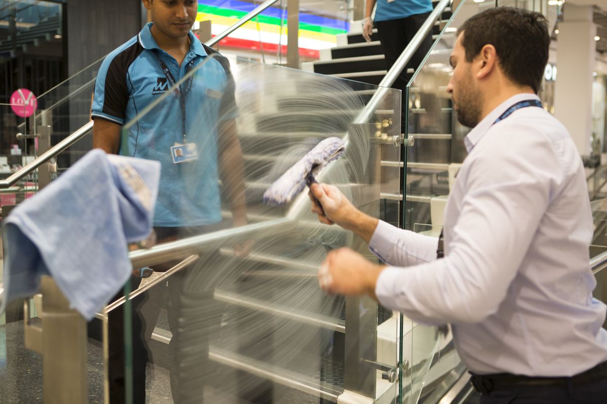 Glass balustrade cleaning in a commercial building